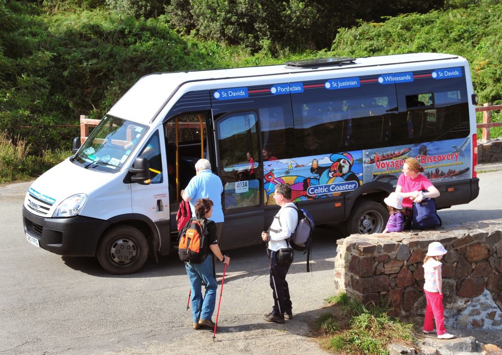 Minibus picking up passengers