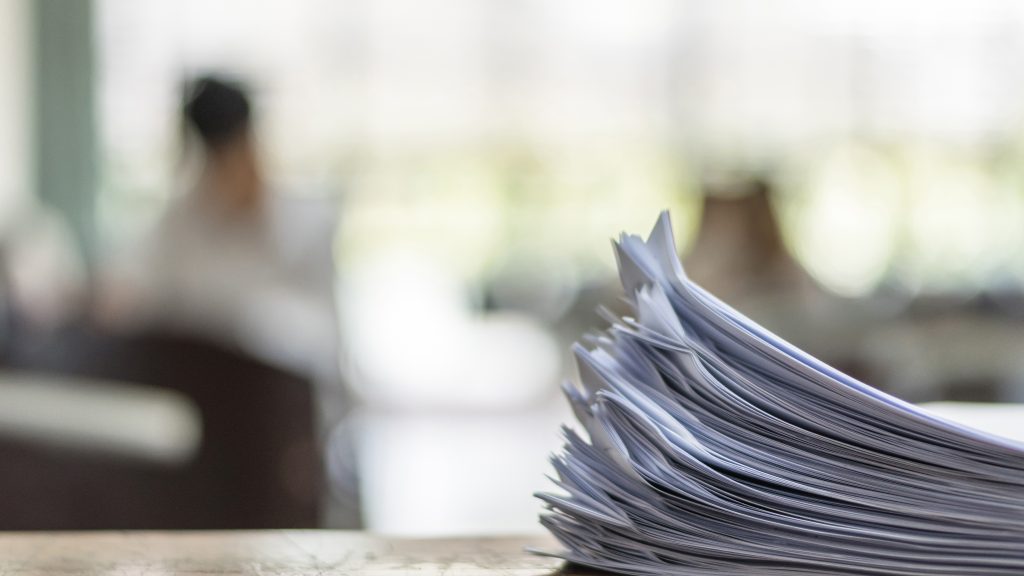 Documents on table in office