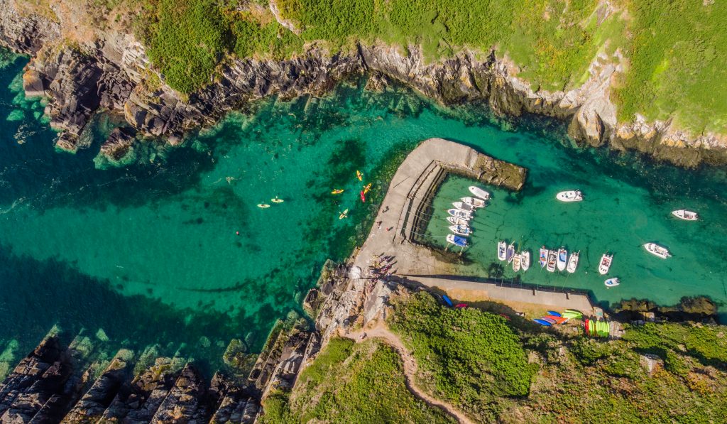 Kayakers at Porth Clais harbour