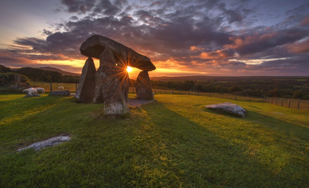 Colorful sunset over Pentre Ifan Burial chamber, Wales
