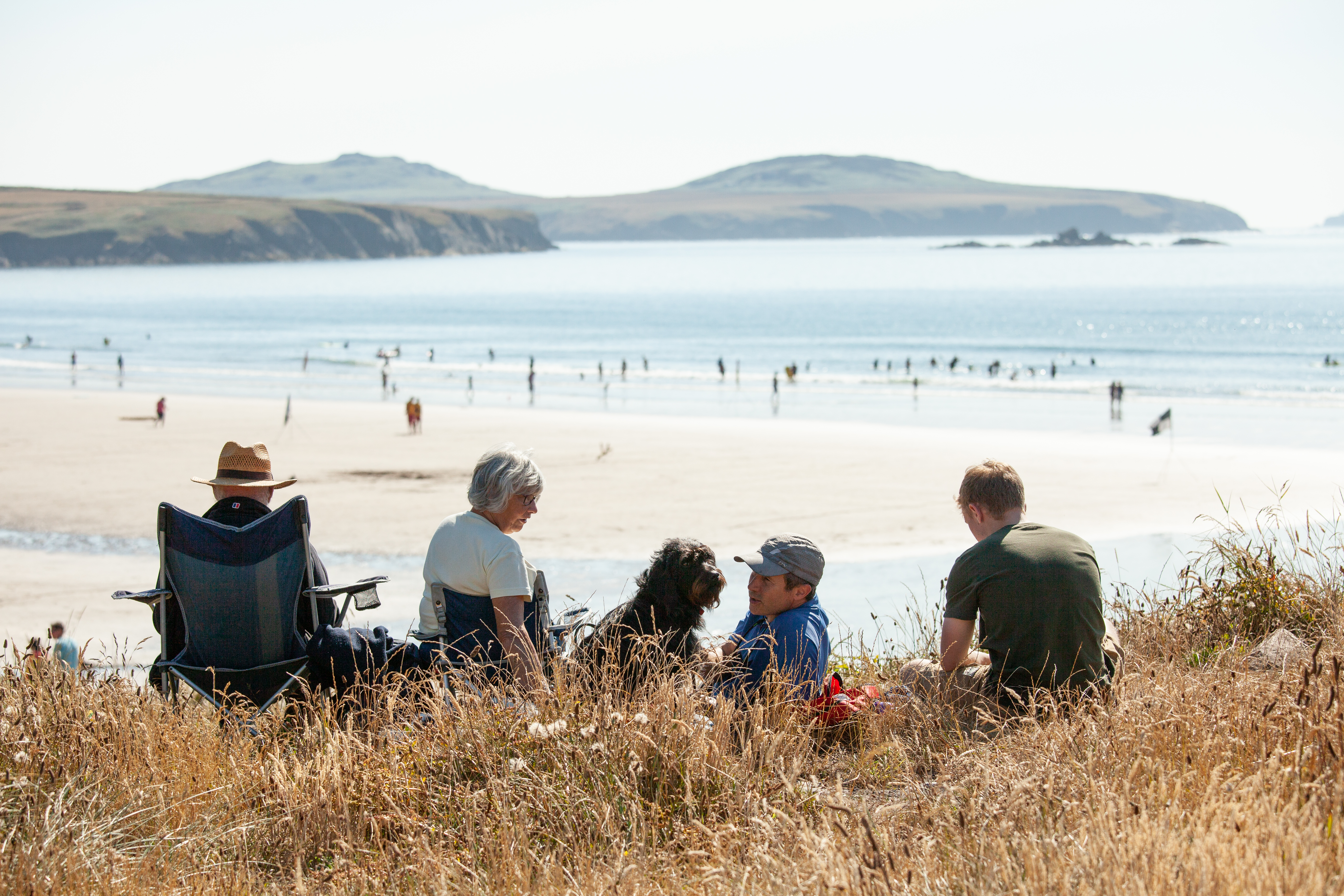 Family at Whitesands Bay, St Davids, Pembrokeshire Coast National Park, Wales, UK