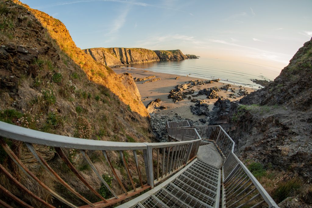 Steps down from the Pembrokeshire Coast Path National Trail to Traeth Llyfn