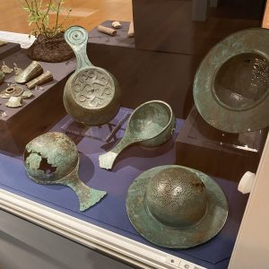 Roman archaeolical finds in a museum cabinet