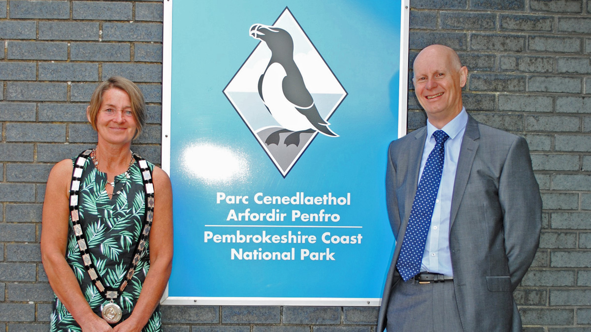 Cllr Di Clements and Chief Executive Tegryn Jones outside the Pembrokeshire Coast National Park Authority headquarters in Pembroke Dock