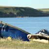 Helena - Dale 2022 Two boats resting on the shore next to the sea on a sunny day. Location pictured is Dale, Pembrokeshire