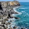Keith St Govans Head 2021 View across limestone cliffs with an aquamarine sea and white waves breaking over the rocks. Location pictures is St Govan's Head, Pembrokeshire