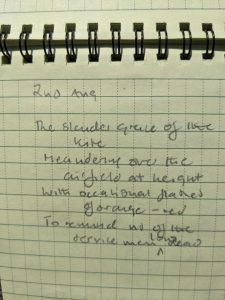 Poem written in a notepad. It reads: 2 Aug. The slender grace of the kite Meandering over the airfield at height With occasional flashes of orange-red To remind us of the servicemen, long dead