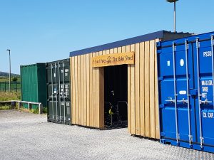 Image of bike shed and storage containers