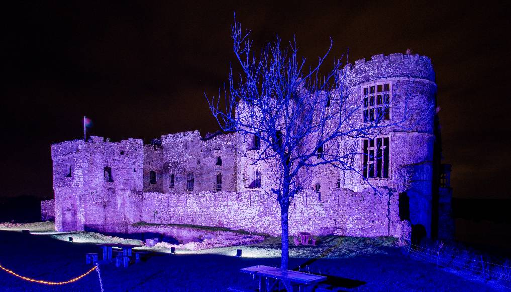 Carew Castle illuminated for the 'Glow' event.