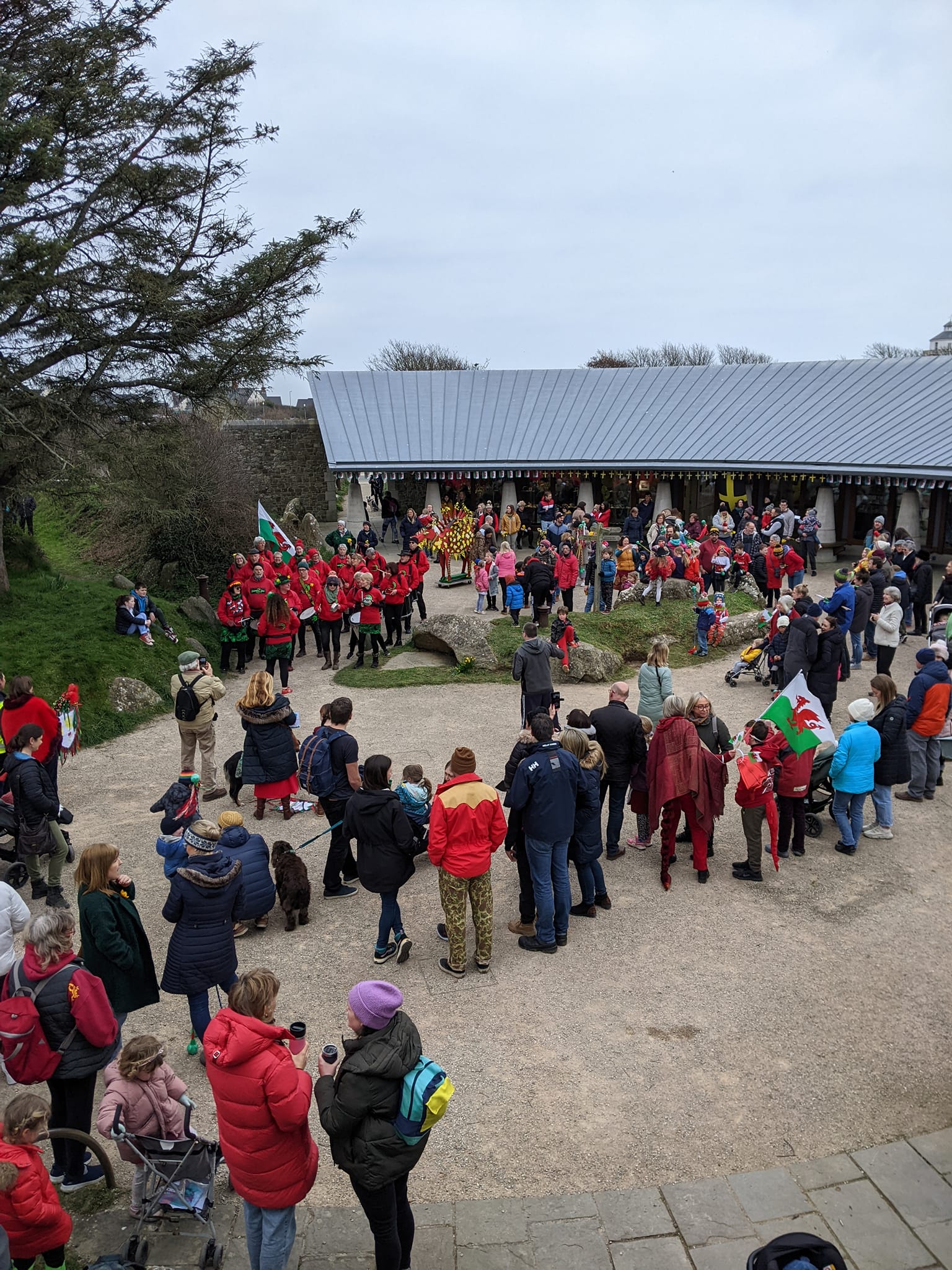 People lining up in Oriel y Parc's courtyard for the annual Dragon Parade