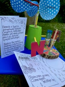 Handmade weather vane, sundial and trail booklet
